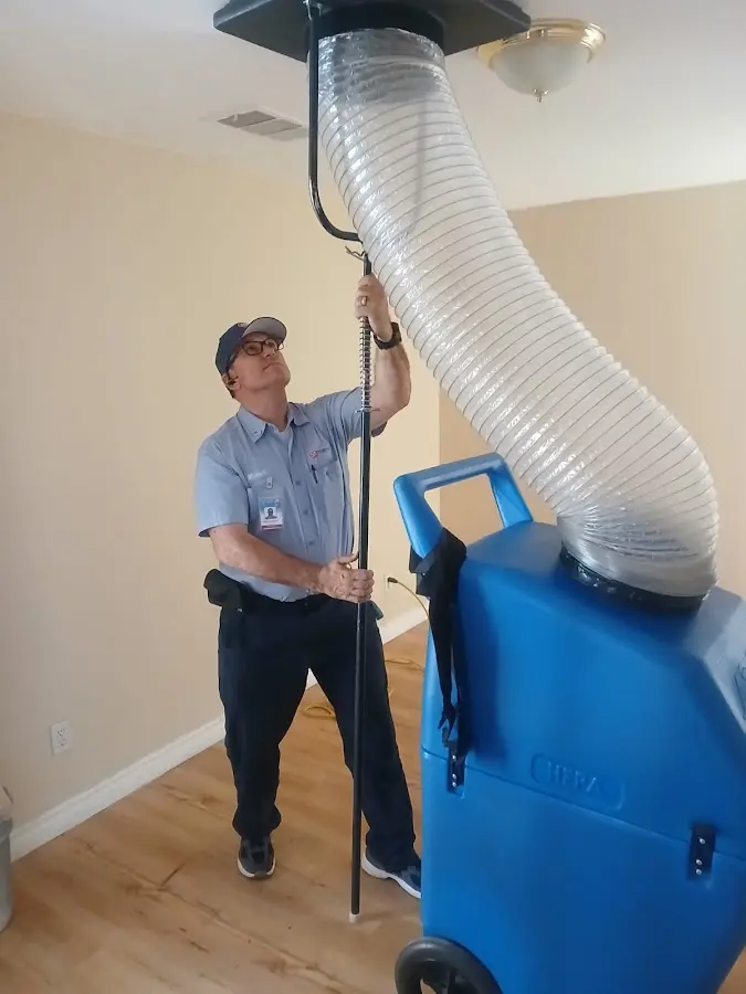 Mini Split Installation technician using HEPA equipment in Gonzales
